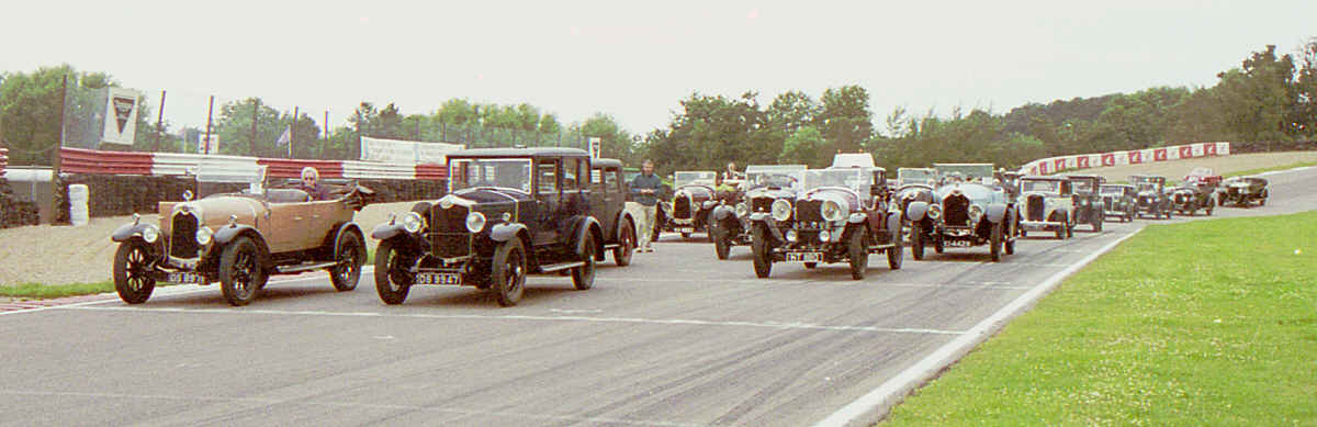 Crossley cars lined up on the grid at Mallory Park
